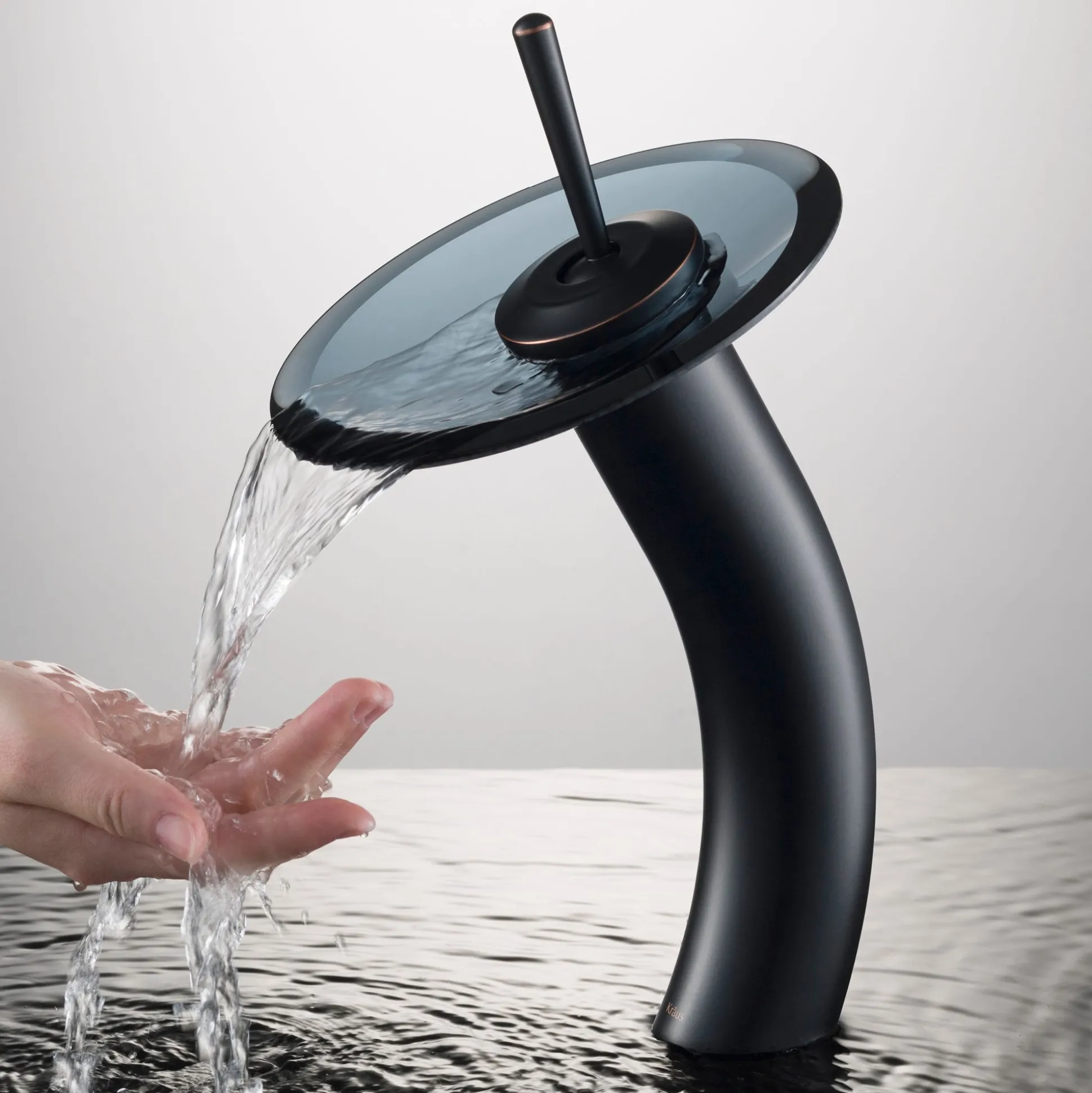 Waterfall Bathroom Faucet with Clear Black Glass Disk and Pop-Up Drain in Oil Rubbed Bronze